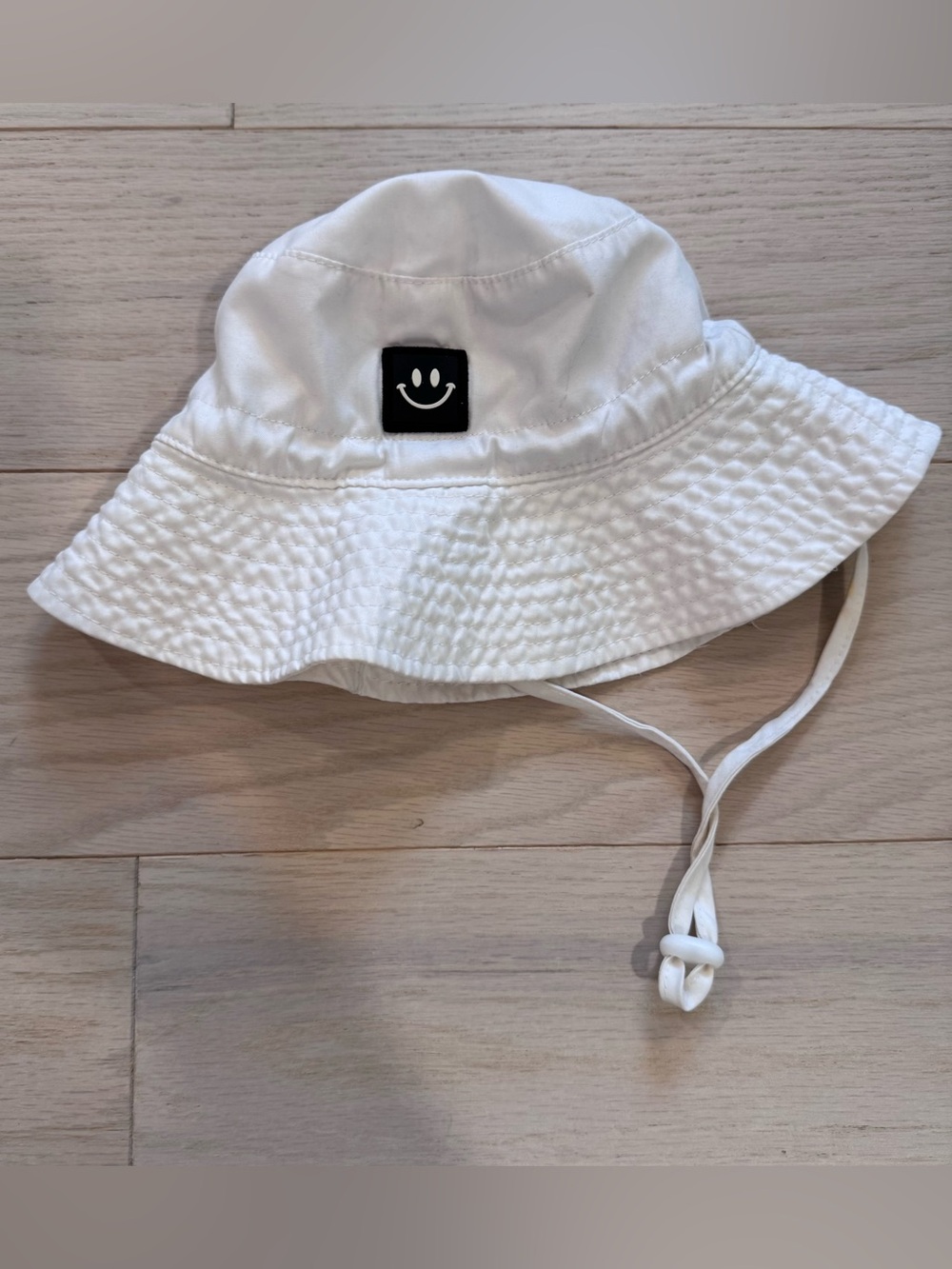 Smiley Patch White Toddler Bucket Hat with Chin Strap